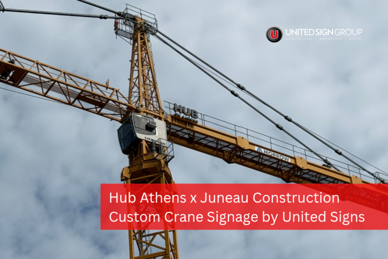 Custom HUB ON CAMPUS dimensional letters mounted on a tower crane by United Signs for Juneau Construction's Athens Georgia jobsite